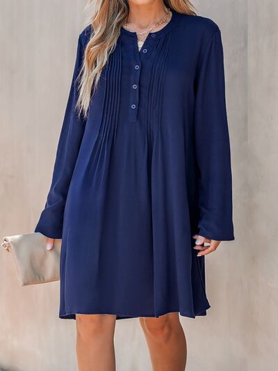 Robe plissée demi-boutonnée à col rond grande taille