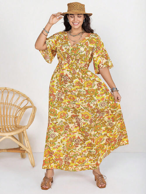 Robe fendue à manches courtes et col en V à motif floral